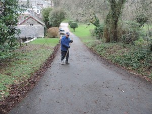 Dave raking the drive